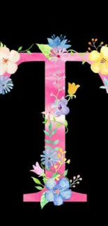 Floral letter T with colorful design on a black background.