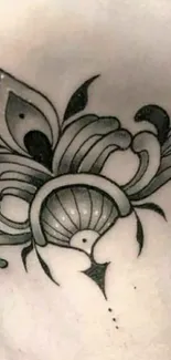 Black and white floral tattoo design on skin, artistic mobile wallpaper.