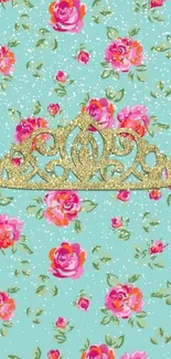 Gold tiara on teal floral wallpaper with pink roses.