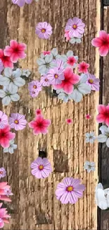 Pink and white floral design on rustic wood.