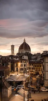 Florence cityscape with iconic dome and dramatic dusky sky reflecting evening light.