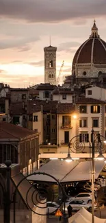 Florence cityscape at sunset featuring the cathedral dome.