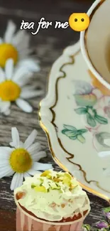 Vintage teacup with chamomile flowers on rustic surface.