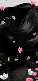 Dark hair with pink blossoms on mobile wallpaper.