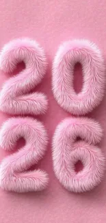 2026 fluffy pink numbers on textured background.