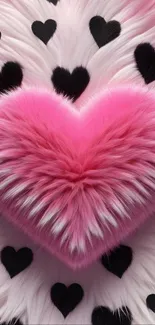 Fluffy pink heart wallpaper with black hearts.