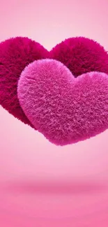 Fluffy pink heart wallpaper with cozy textures.