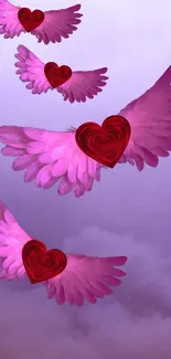 Purple wallpaper with flying red hearts and pink wings.