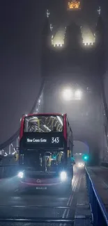 Foggy Tower Bridge in London with bus at night.