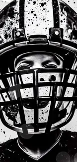 Monochrome artwork of a football helmet with paint splatters.