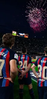 Football players standing in stadium with fireworks display.