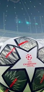 Champions League football in illuminated stadium at night.