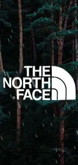 North Face logo on a dark forest background wallpaper.