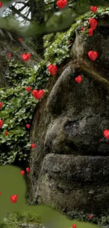 Moss-covered stone face with red hearts in a forest setting.