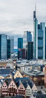 Frankfurt cityscape wallpaper with skyscrapers and historic buildings.