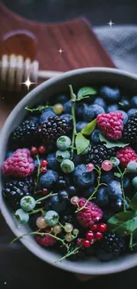 Vibrant mobile wallpaper featuring a bowl of fresh berries.