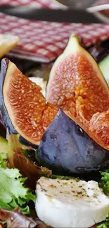 Close-up of a fresh fig salad with vibrant greens and cheese slices.