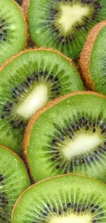 Close-up of vibrant green kiwi slices, showcasing their natural texture.