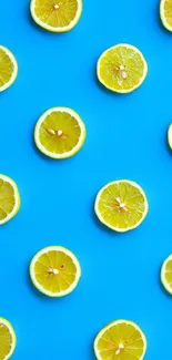 Vibrant lemon slices on a bright blue background for mobile wallpaper.