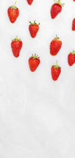 Minimalist wallpaper with strawberries on white.