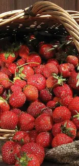 Fresh strawberries spilling from a basket.