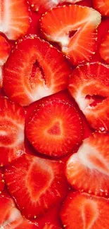 Close-up of fresh sliced strawberries as wallpaper.