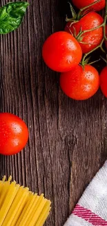 Vibrant fresh tomatoes on wooden background with pasta and basil.