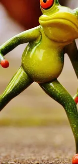 Green frog figurine playing soccer with a ball on a natural background.