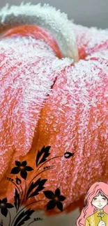 Frosted orange pumpkin with floral art and cartoon character.