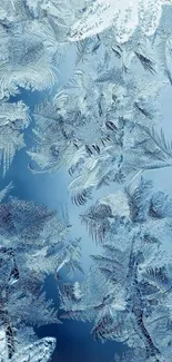 Frosty blue wallpaper with intricate ice patterns.