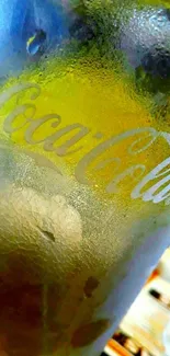 Frosty Coca-Cola glass with vibrant colors and condensation.