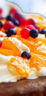 Close-up of a vibrant fruit dessert with berries and citrus slices.