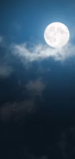 Full moon illuminating a serene night sky with scattered clouds and stars.