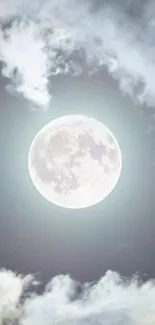 Glowing full moon with clouds in the night sky for mobile wallpaper.