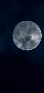 Full moon shining in a tranquil dark night sky over a mobile wallpaper.