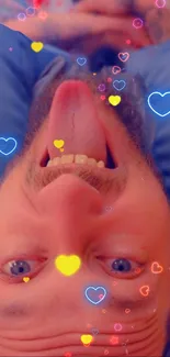 Upside down face with neon hearts overlay.