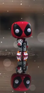 Funko Pop Deadpool with reflection in whimsical setting.