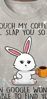 Cartoon bunny drinks coffee with a humorous message on a t-shirt.