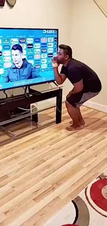 A funny moment in a living room with TV interaction.