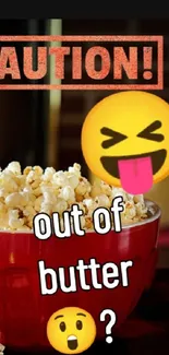 Caution sign with popcorn in red bowl and emojis on phone wallpaper.