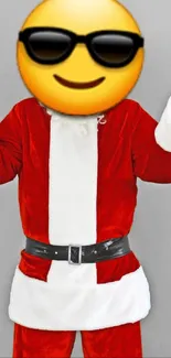 Funny Santa Claus emoji with sunglasses on a red suit.