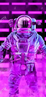 Neon astronaut standing in vibrant pink haze.