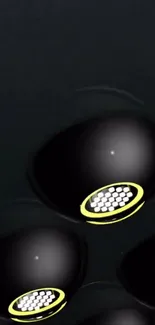 Sleek black spheres glowing on dark background, perfect for a modern wallpaper.