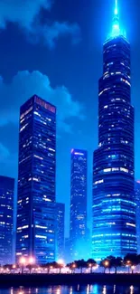 Futuristic cityscape wallpaper with blue skyscrapers at night.