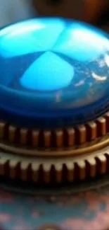 Futuristic blue button with golden gears design in a mobile wallpaper.