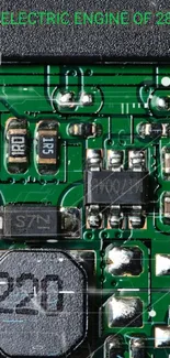 Green circuit board with electronic components.