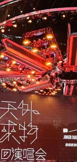 Futuristic concert stage with red lighting.