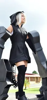 Futuristic cosplay in black costume, outdoor setting.