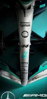 Futuristic Formula 1 car with teal accents.
