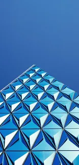 Futuristic geometric blue wallpaper with abstract triangular design.